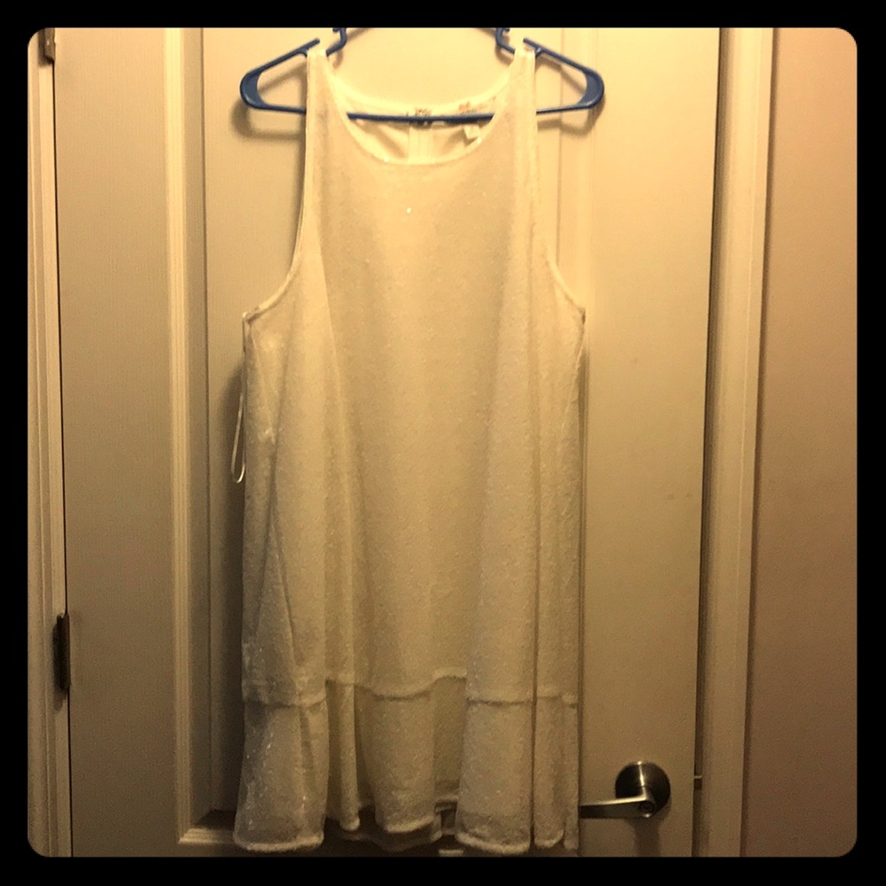 White sequin dress by Lauren Conrad